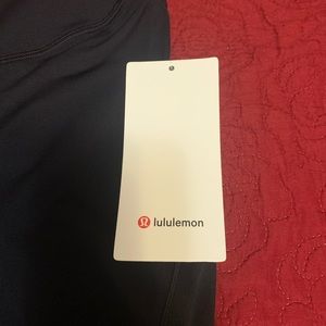 Brand New black Lulumelon tights with tag, never tried on it worn.